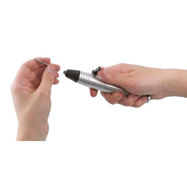 Close-up demonstration of a jeweler using the quick-release lever on the Foredom H.20 handpiece to exchange a rotary bur.