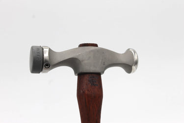Close-up of Fretz HMR-6 head showing hex socket set screw locking removable plastic insert