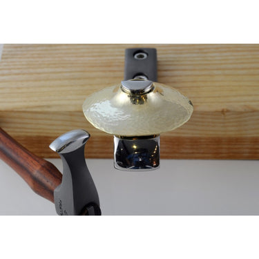 Fretz HMR-9 hammer blocking and forming a curved brass bowl form over a polished metal stake.