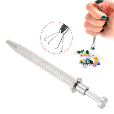 Fluted handle 4-prong diamond pick-up tool with inset showing loose colored gemstone grasping demo.