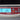 Close-up of the MZ-K3000 illuminated blue digital screen showing a karat reading and control buttons.