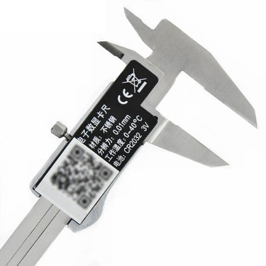 The reverse side of a Guanglu digital caliper showing CE markings and battery specifications.