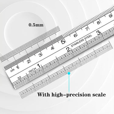 Close-up of a high-precision stainless steel ruler highlighting fine 0.5mm and inch measurement increments.