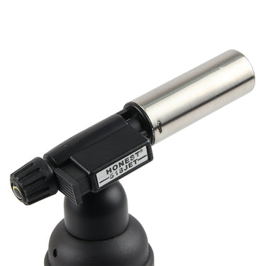 Close-up of stainless steel burner barrel and trigger assembly on HONEST 518JET torch.
