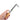 Hand holding jewelry soldering blowpipe torch adjusting gas regulation valve control knob.