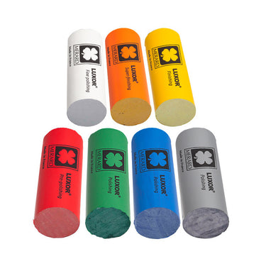 Seven different colors of LUXOR polishing compounds.