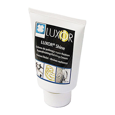 Angled view of a 100ml LUXOR® MERARD Shine Superfinishing Polishing Cream tube for jewelry and metal.