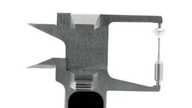 High-precision measurement of a loose gemstone using Presidium digital caliper jaws.