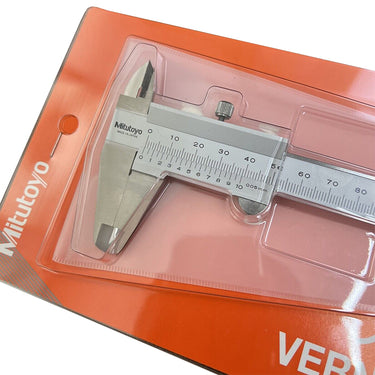 Close-up of the hardened stainless steel measuring jaws on a Mitutoyo vernier caliper.