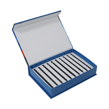 Ten Mohs hardness testing pencils arranged inside a padded blue storage presentation box, viewed from the left.