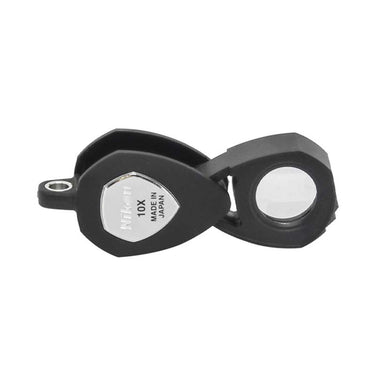 Fully extended Nikon Triplet 10X magnifier showing the high-clarity lens and durable matte black housing.