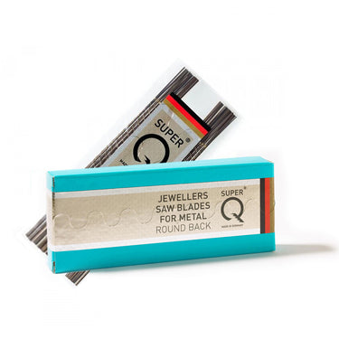 Bundles of NIQUA Super Q metal jeweler's saw blades shown with their teal and silver wholesale retail packaging box.