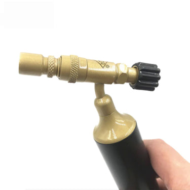 Side profile view of the ORCA Hobby MP99 torch head showing the brass body adjustment rings and black gas valve knob.