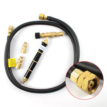 ORCA M75 torch body and extra tips on a coiled hose with a circular inset highlighting the threaded brass adapter