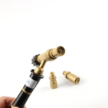 Detailed perspective view of the brass burner nozzle end attached to the ORCA M75CMG torch handle
