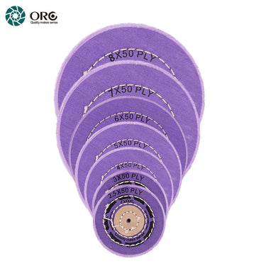 Stacked ORO berry purple muslin buffs showing the variety of sizes available for fine jewelry finishing.