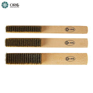 Top-down view of three ORO brass wire cleaning brushes with natural wooden handles showing bristle density.