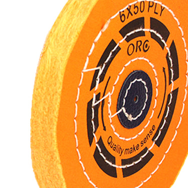 Side profile of an ORO dark yellow muslin buff showing thick fabric layers and chemically treated durable edges.