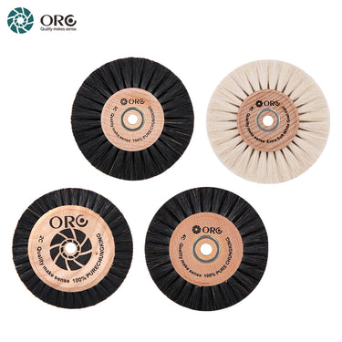 A group of four ORO wooden center polishing wheels arranged on a clean white background.