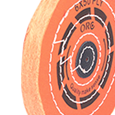 Side profile of an ORO orange muslin buff highlighting the thick, chemically treated fabric layers.