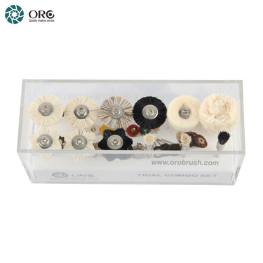 Top-front close up view of different rotary polishing and abrasive brushes arranged inside the ORO trial combo box.
