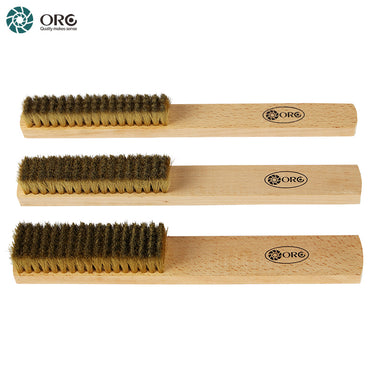 Side profile view of three ORO wooden handle brass scratch brushes arranged horizontally.