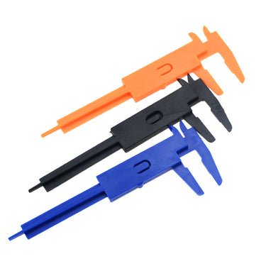 Back view of orange black and blue 80mm plastic vernier calipers showing depth bars.