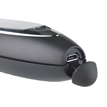 Close-up of the micro-USB charging port with a protective rubber cover on Presidium Adamas.