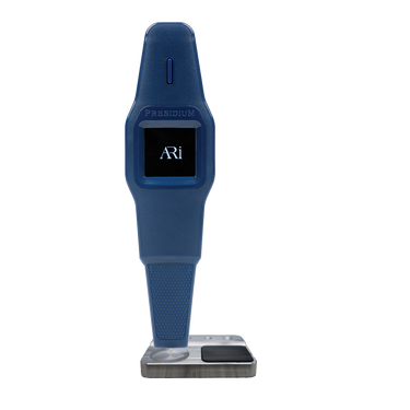 Presidium ARi tester placed on the left side of its dedicated testing base.