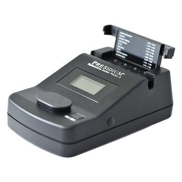 Isometric view of the Presidium gemstone tester with internal reference chart visible.