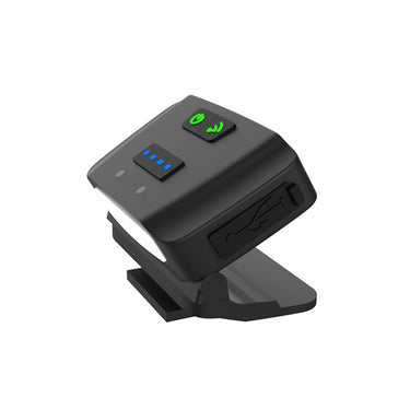 Close-up of the detachable LED light module for SmartPro OptiLoupe, showing buttons and USB charging port cover.