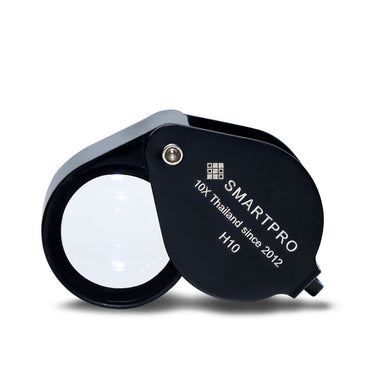 Close-up of the black SmartPro H10 Triplet Loupe featuring 10X magnification.