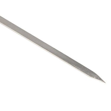 Close-up view of the sharp pointed tip on a Stuccler titanium soldering pick for precise probe positioning.