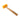 High angle view of a Stuccler yellow polyurethane mallet positioned diagonally, pointing to the bottom right.