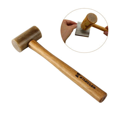 High angle view of a Stuccler rawhide mallet with an inset showing a person shaping a metal ring on a bench block.