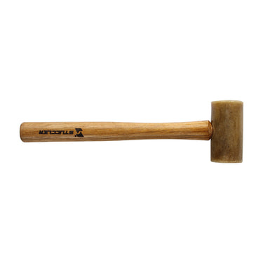Horizontal flat lay of a Stuccler natural rawhide hammer with its wood handle stretching to the left.