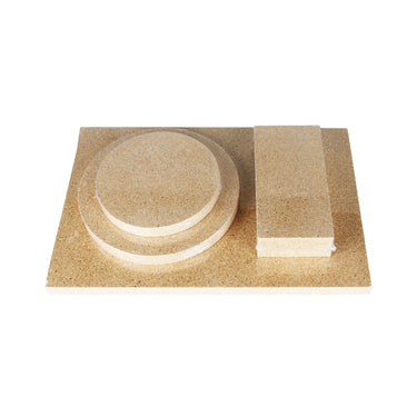 Top down view of rectangle round and block vermiculite heat resistant soldering boards grouped together