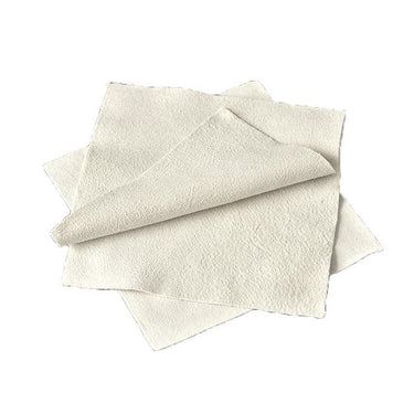 Multiple square synthetic chamois cleaning cloths stacked offset on top of each other.