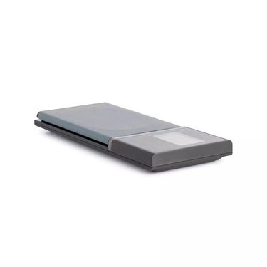 Side profile view showing the slim, portable design of the Tanita 1479J2 digital pocket scale.