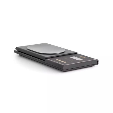 Side view showing the slim and compact profile of the Tanita professional mini scale.