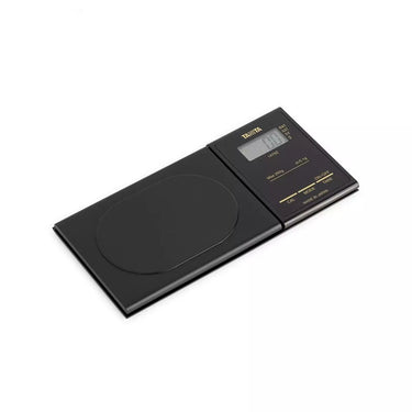 Angled view of the sleek black Tanita 1479Z premium digital pocket scale.