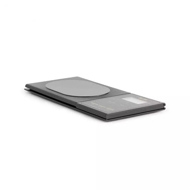 Side view showing the ultra-slim and portable profile of the Tanita 1479Z scale.