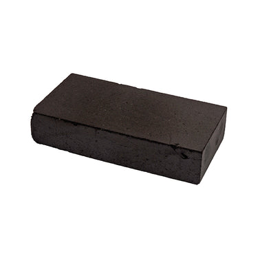 Isometric view of a Technique Asic compressed charcoal block for jewelry soldering tilted toward the right.