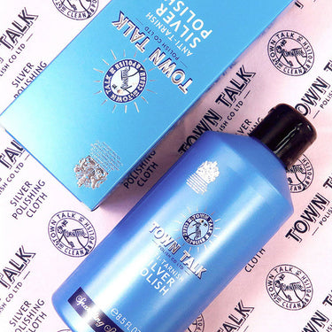 Town Talk Silver Polish bottle and box displayed against a branded logo background.