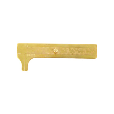 A fully closed TSK brass sliding vernier caliper tool highlighting the smooth brass locking pin.