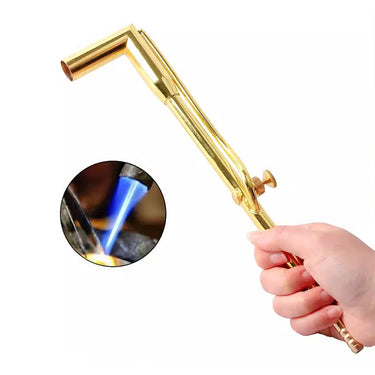 Hand holding brass double orifice jewelry welding torch shown with blue flame soldering inset.