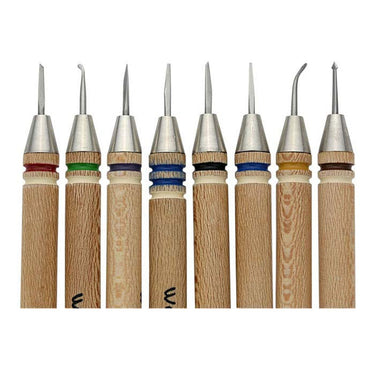 Detailed view of eight different micro carver tips showing various blade shapes and color-coded bands.