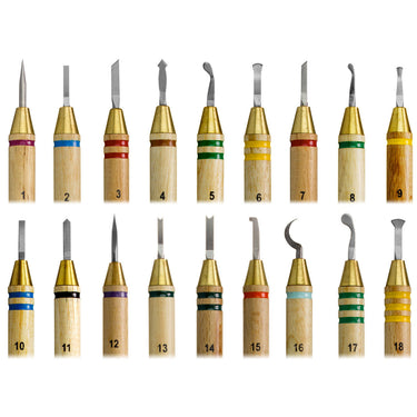 Close-up of 18 different numbered wax carver tips showing various blade shapes.