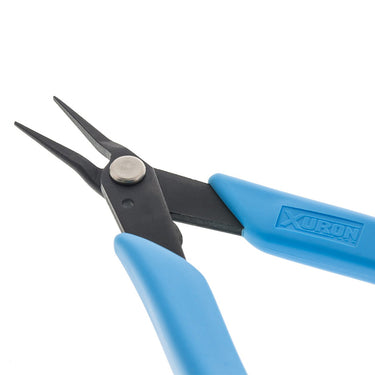 Angled close-up of Xuron 450 pliers showing the slim profile and rivet joint.