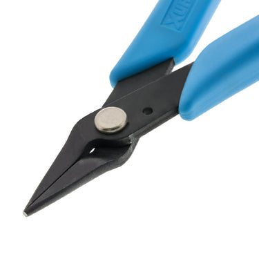 Close-up of the smooth, tapered jaws on a Xuron chain nose plier to prevent marring wire.